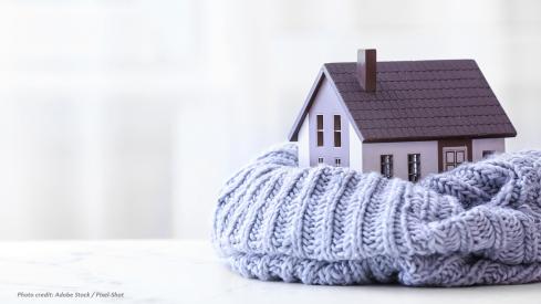 Toy house wrapped in scarf image